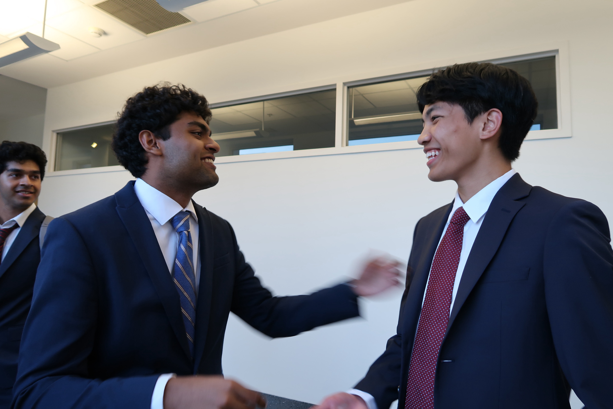 812 Consulting members connecting after a team meeting
