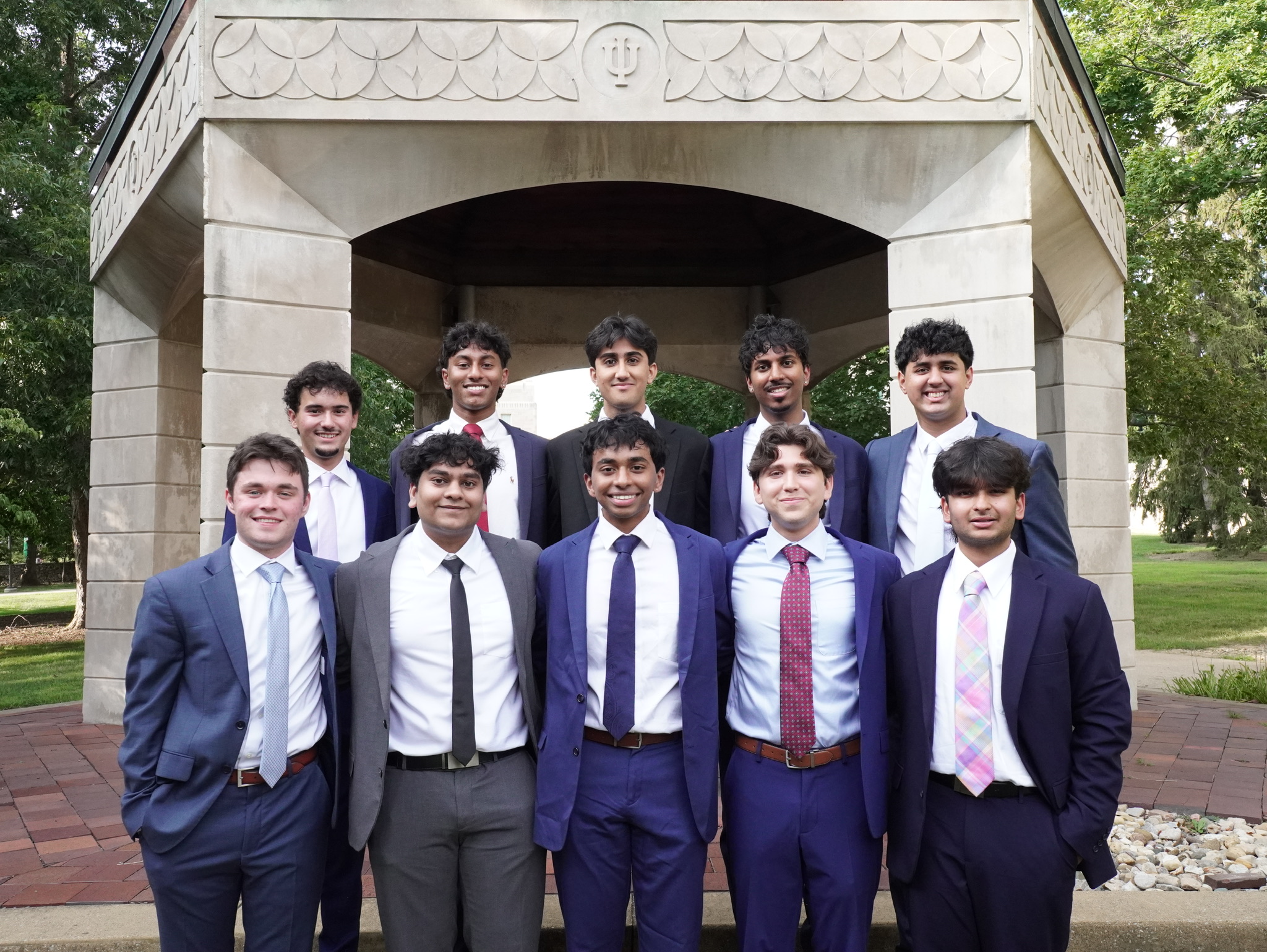 812 Consulting members representing project teams in professional attire
